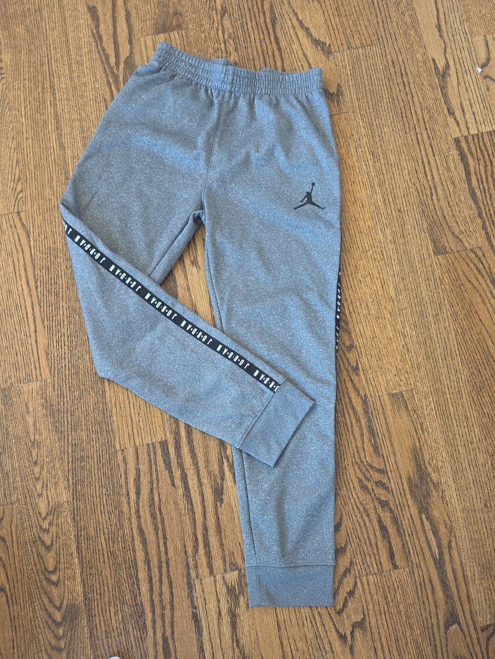 Jordan Kids Gray Fleece Joggers with Black Logo and Side Tape